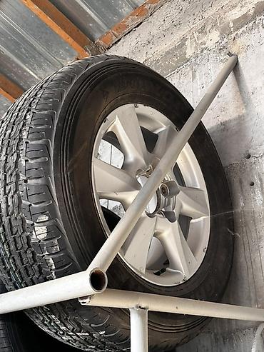 Комплект колес в сборе: шины Dunlop на литых дисках 570 Lexus родной