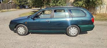 Nissan Primera: 2001 г., 1.8 л, Механика, Бензин, Универсал at lalafo.kg Nissan Primera: 2001 г., 1.8 л, Механика, Бензин, Универсал