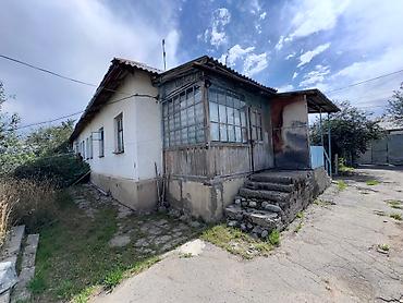 70000: > Дом с большим потенциалом в г. Каракол! (ул. Орозбекова, 32) > — 10