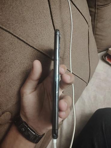 Mobil telefonlar: IPhone X, Qara, Face ID — 3