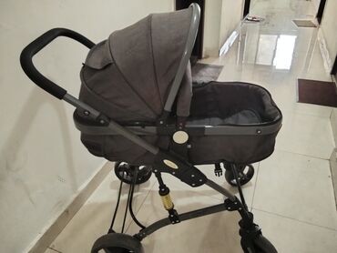 uşaq yay krossovkaları: Klassik gəzinti arabası, Graco, Yeni
