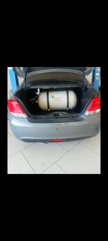 Soyutma və qızdırma sistemləri: Avtomobilin baqajında quraşdırılmış Autogas qaz sistemi. Bu sistem
