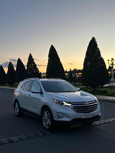 şevralet equinox: Chevrolet Equinox – ağ rəngli, şəhər və uzun yol üçün rahat krossover — 3