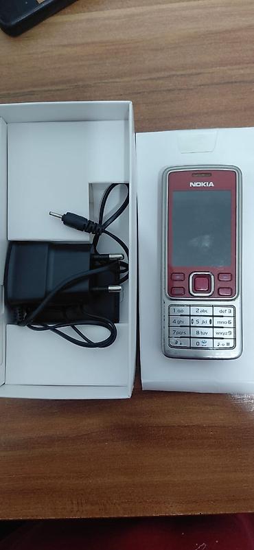 nokia n76: Nokia 6300 (RM‑217), красно‑серебристая версия. Классический кнопочный — 3