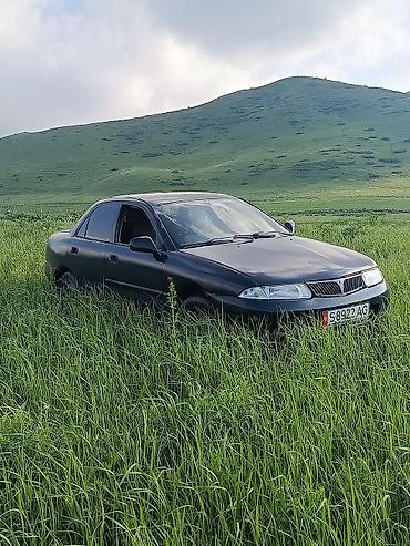 мото мапеь: Mitsubishi Carisma: 1999 г., 1.8 л, Механика, Бензин, Седан — 2