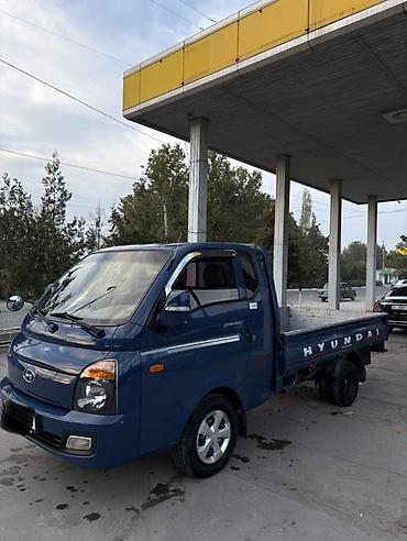 m5 e60 v10: Hyundai Porter II, бортовой малотоннажный грузовик - Тип кузова — 2