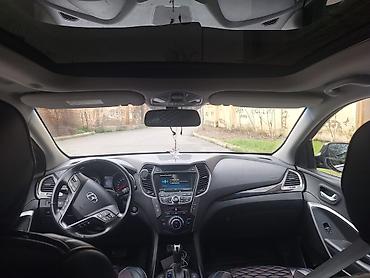 ford focus hatchback: Hyundai Santa Fe: 2 l | 2014 il Krossover — 8
