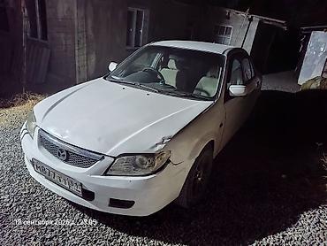 митсубиси цена: Mazda Familia: 2001 г., 1.3 л, Автомат, Бензин, Седан — 6