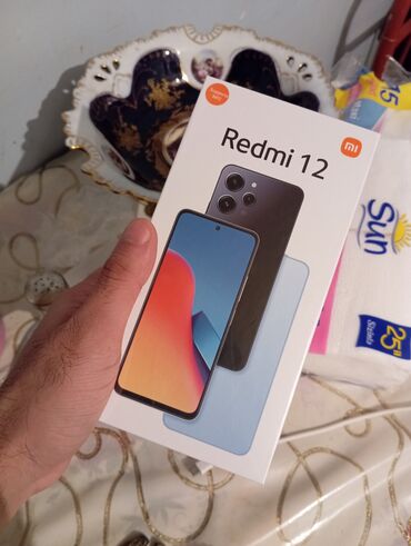 Xiaomi: Xiaomi 12, 256 GB, rəng - Mavi, 
 Sensor, Barmaq izi, İki sim kartlı