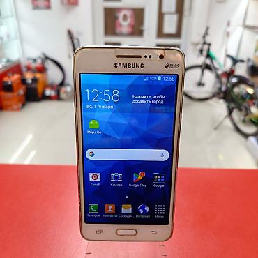 philips xenium 9@9s: Samsung Galaxy Grand Dual Sim, 2 GB, rəng - Qızılı, Barmaq izi, Düyməli — 1