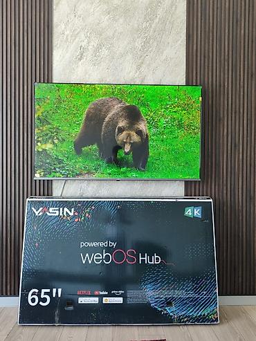 Телевизоры: Телевизор Smart TV с крупной диагональю (около 55–65"), тонкими — 6