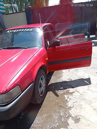 Транспорт: Mazda 626: 1991 г., 2 л, Механика, Бензин, Седан — 2
