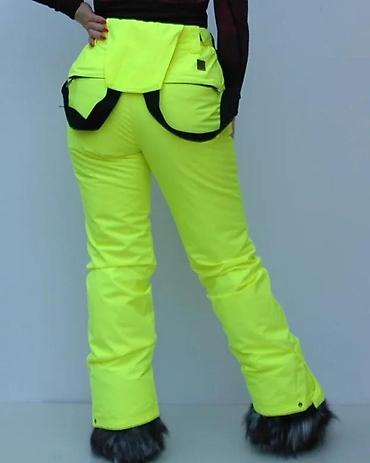 Ski pantalone: Ženske skijaške pantalone u jarko neon žutoj boji, dizajnirane za — 1