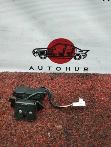 коробка на нексия: Замок багажника TOYOTA CALDINA AZT241W 2005 (б/у)