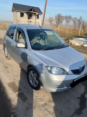 чехлы на авто: Mazda Demio: 2002 г., 1.3 л, Автомат, Бензин, Хэтчбэк