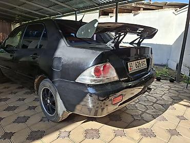 mitsubishi evo 8: Mitsubishi Lancer: 2005 г., 1.6 л, Автомат, Бензин, Седан — 4