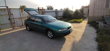 Mazda: Mazda Cronos: 1996 г., 1.8 л, Механика, Бензин, Хэтчбэк