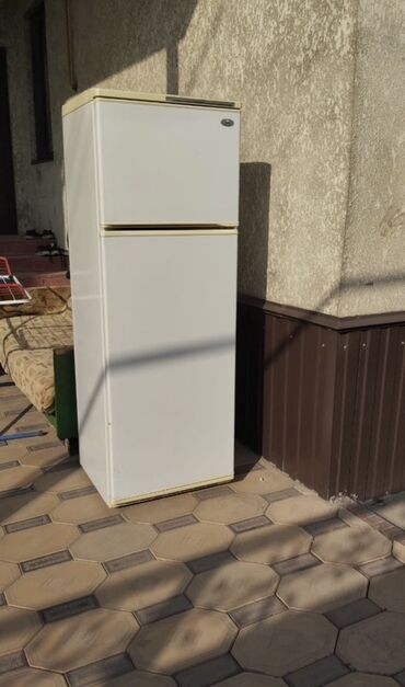 халадилник марожный: Двухкамерный холодильник с верхней морозильной камерой. Особенности