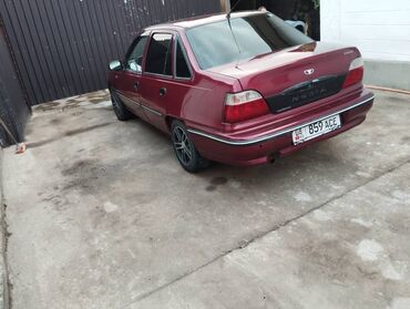 дево нехся: Автомобиль Daewoo Nexia в бордовом цвете, представленный в кузове