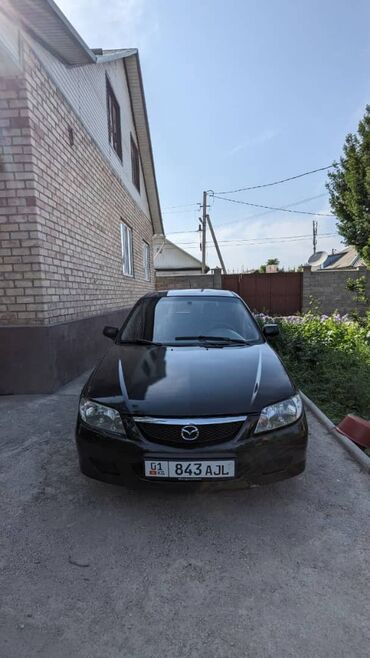Mazda: Mazda 323: 2002 г., 1.6 л, Механика, Бензин, Хэтчбэк
