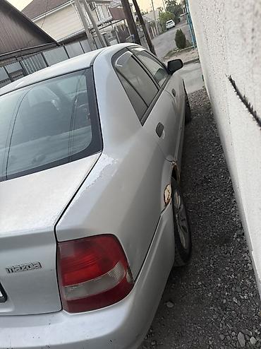 byd 2: Mazda Protege: 2000 г., 1.5 л, Автомат, Бензин, Седан — 4