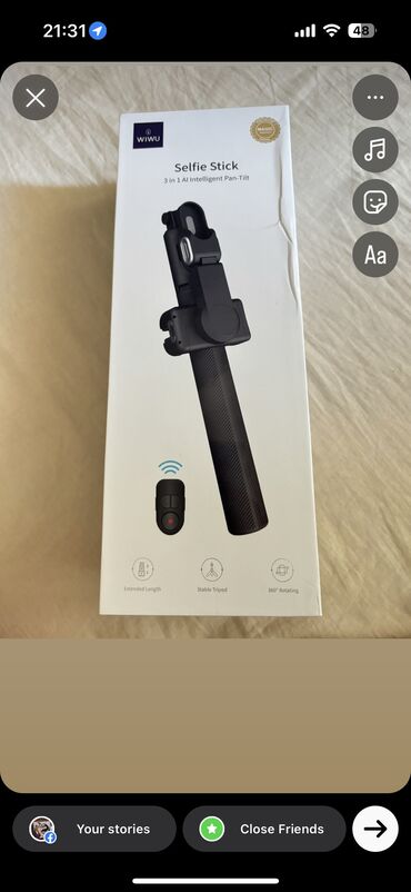 online telefon aksesuarları: Hem tripod hem selfie cubugu. Bluetooth ile baglanmasi var