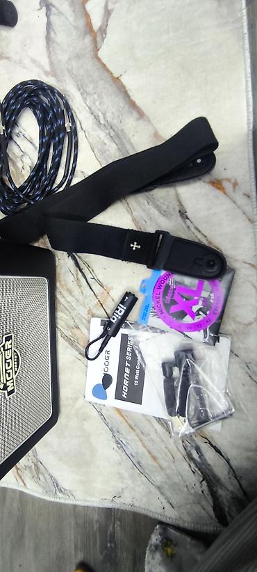 Elektro gitaralar: Elektrik gitara seti – tam paket Məhsul tərkibi: - Strat tipli — 2