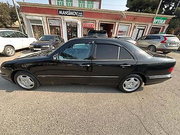 mercedes şəkilləri: Mercedes-Benz E-Class: 2.3 l | Sedan — 1