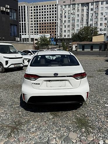 byd e6: Toyota Corolla: 2023 г., 1.8 л, Гибрид, Седан — 5