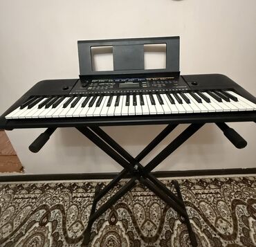 виолончель купить: Цифровой синтезатор Yamaha PSR-E373 черного цвета. Инструмент оснащен