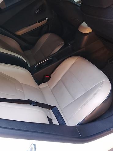 byd e2 2024: Chevrolet Volt: 2012 г., Вариатор, Гибрид, Хэтчбэк — 8