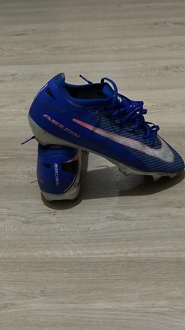Бутсы: Nike Mercurial Air Zoom – профессиональные футбольные бутсы. По цене — 1