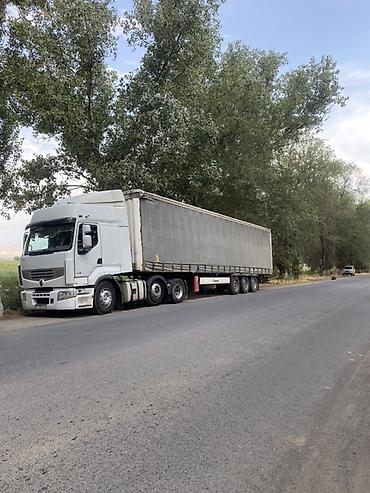 100 перохдка: Тягач, Renault, 2012 г., Тентованный — 1