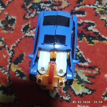 Игрушки: Игрушка-трансформер, способная менять форму из автомобиля в робота — 12