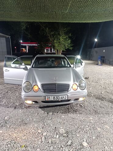 купить передний бампер на мерседес w210 в бишкеке: Серебристый седан Mercedes-Benz E-Class с классическим дизайном