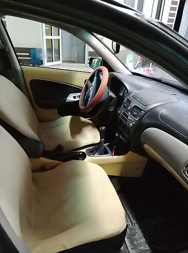 водный катер: Nissan Almera: 2001 г., Механика, Хэтчбэк — 6