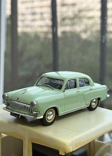 model 1: Deagostini firmasina mexsus olan qaz 21 modeli 1:43 olcu vezyeti — 1