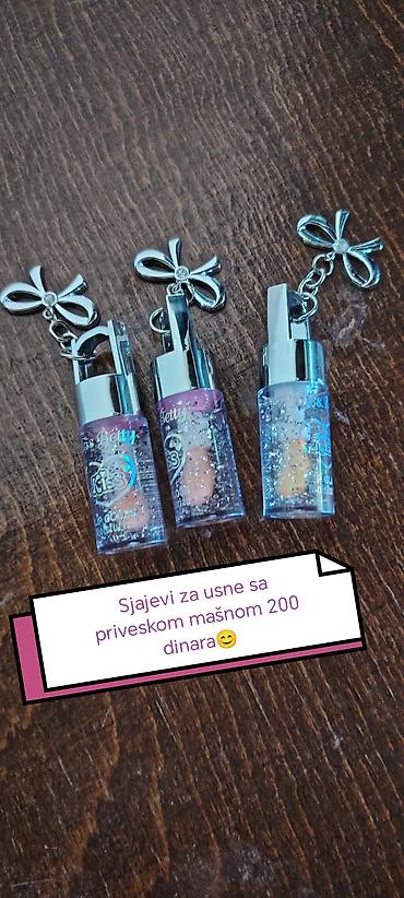 roze naocare: Sjajevi za usne sa priveskom u obliku mašne. - Prozirna formula sa — 1