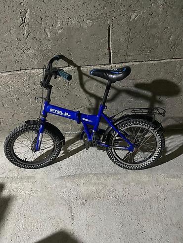 irsad telecom velosiped: Mavi rəngli BMX tipli velosiped. Kompakt ölçülü çərçivəyə malikdir və — 5