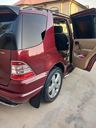 Digər avtomobillər: - Növ: SUV, 5 qapı - Korpus rəngi: tünd qırmızı/bordo - Salon: açıq — 12