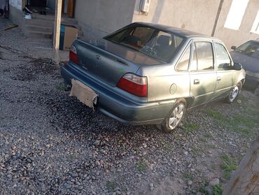 мотор нексия 1: Daewoo Nexia: 1994 г., 1.5 л, Механика, Бензин, Седан