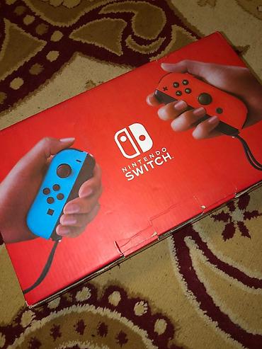switch 2: Продаю игровую консоль Nintendo Switch в классической расцветке Neon — 1