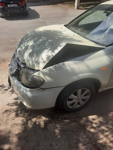 2 5 dizel mator: Nissan Sunny: 1.3 l | 2006 il Sedan — 1
