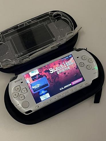 playstation satilir: Sony PSP 3000 (PlayStation Portable) – ağ rəng Tərtəmizdir, üzərində — 1