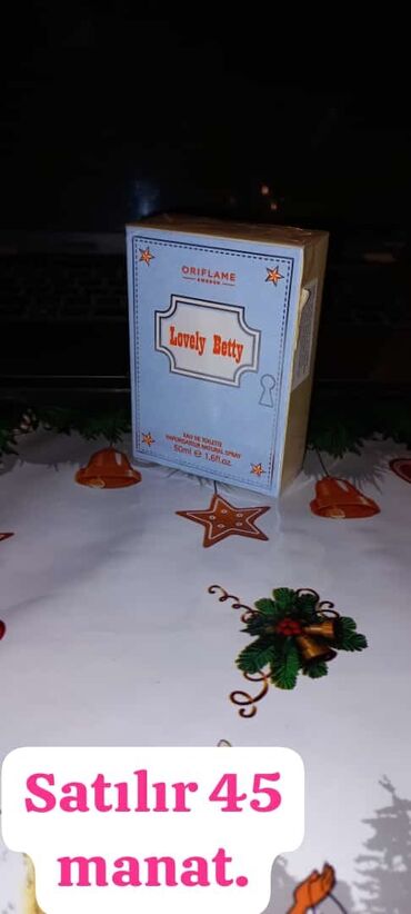 Ətriyyat: Oriflame brendinin "Dancing Lady Hypnotic Night" ətri. Bu ətir 50 ml — 66