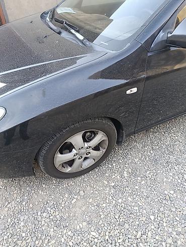 растаможка авто: Hyundai Elantra: 2 л | 2009 г. Седан — 10