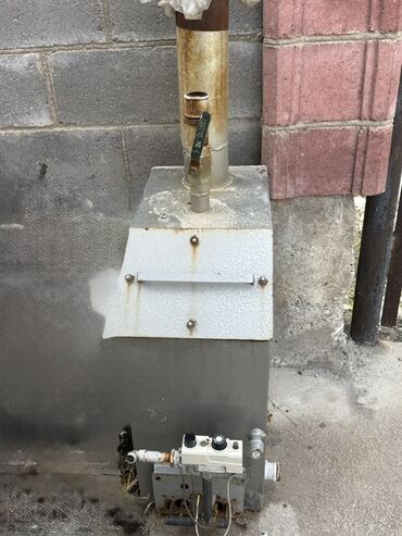 газовый камен: Газовая колонка/котёл напольного типа с атмосферной горелкой