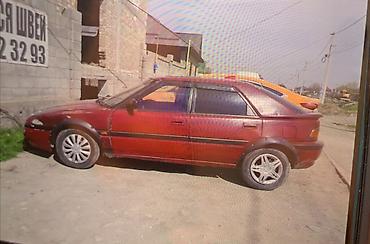 эшке: Mazda 323: 1994 г., Кол менен иштөөчү, Бензин, Хетчбек — 2