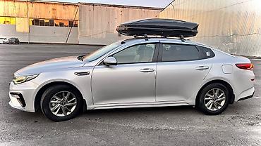 Другие детали салона: Kia К5 - Просторный салон с кожаной отделкой, задний диван на 3 места — 5