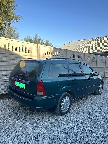 проверить авто по номеру: Ford Focus: 2002 г., 2 л, Автомат, Бензин, Универсал — 2